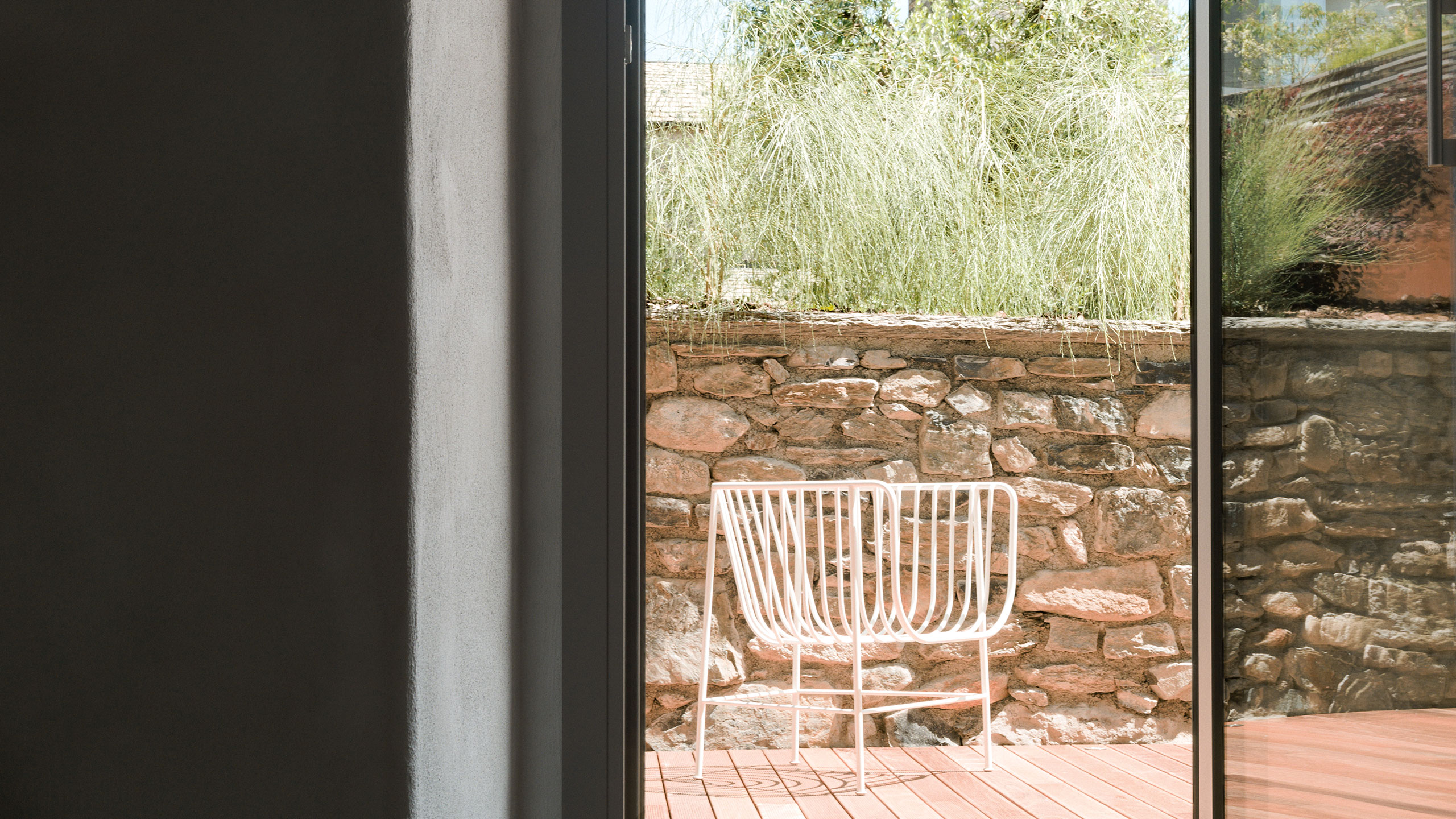 Casa Olea Hotel is a renovated old vicarage located in Cremia, Lake Como - Italy. With the rustic original wooden beams and stone vaulted bathroom, The Junior Suite with garden side patio is the most historically preserved room.